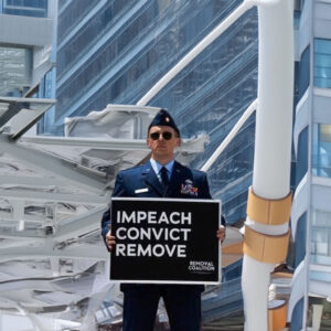 Major Jason Watson Protest Sign